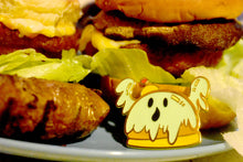 Load image into Gallery viewer, 2-inch Gold Plated Hard Enamel Pin - Booger with Ghost and Burger Pun Design (Glow in the Dark Feature)