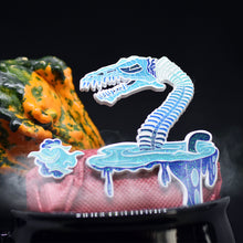 Load image into Gallery viewer, Lochness Monster Limited Edition Pin Sets - Soft Enamel with Epoxy - Collect Before They Disappear - 3-inch Size - Backstamp and Laser Numbering - Includes Matching Vinyl Sticker - Various Designs and Metal Plating - Full Glow, Glitter, and Specialty Options - Order Now