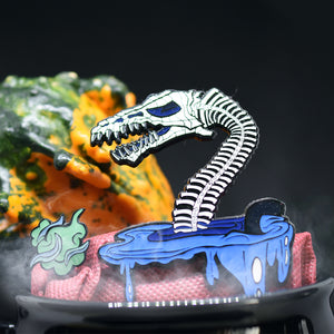 Lochness Monster Limited Edition Pin Sets - Soft Enamel with Epoxy - Collect Before They Disappear - 3-inch Size - Backstamp and Laser Numbering - Includes Matching Vinyl Sticker - Various Designs and Metal Plating - Full Glow, Glitter, and Specialty Options - Order Now